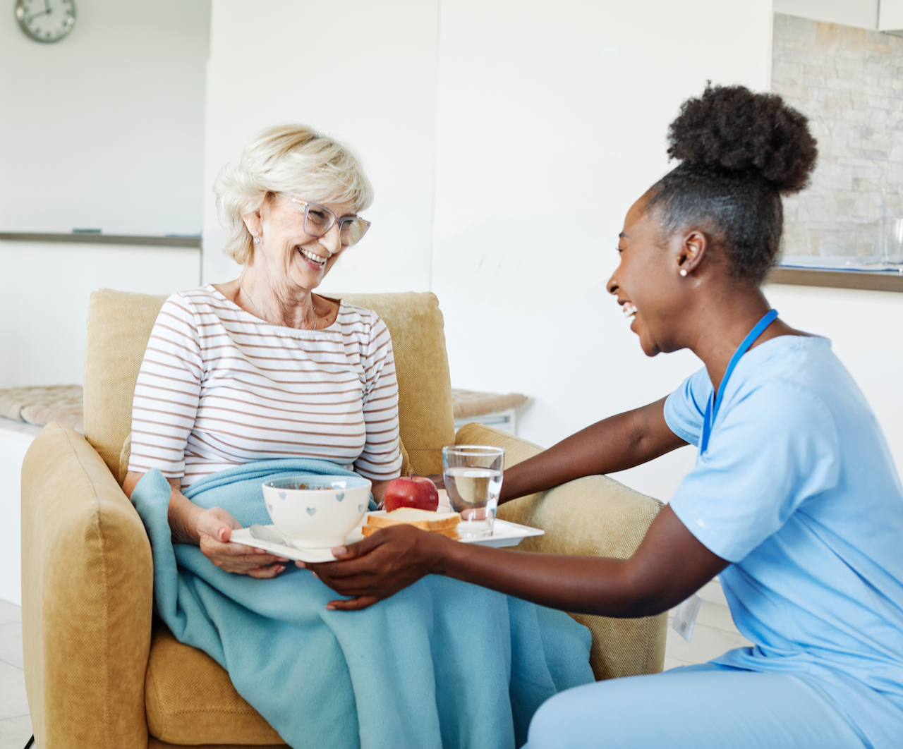 nurse senior woman home care patient elderly lunch caregiver meal food hospital eating eat recovery health retirement assistance nursing old support reaching out